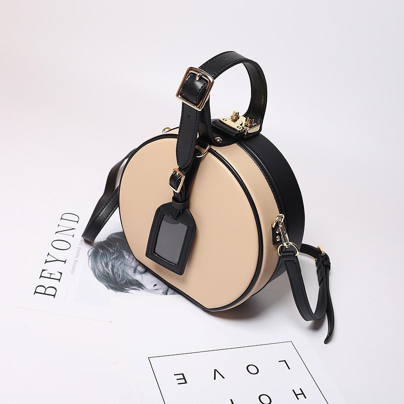 Diagonal bag leather box bag